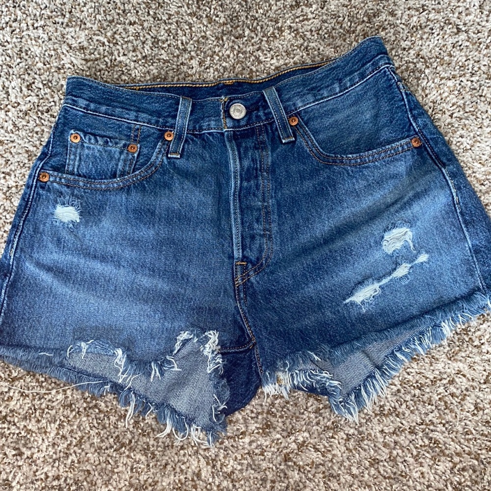 Levi’s distressed shorts.